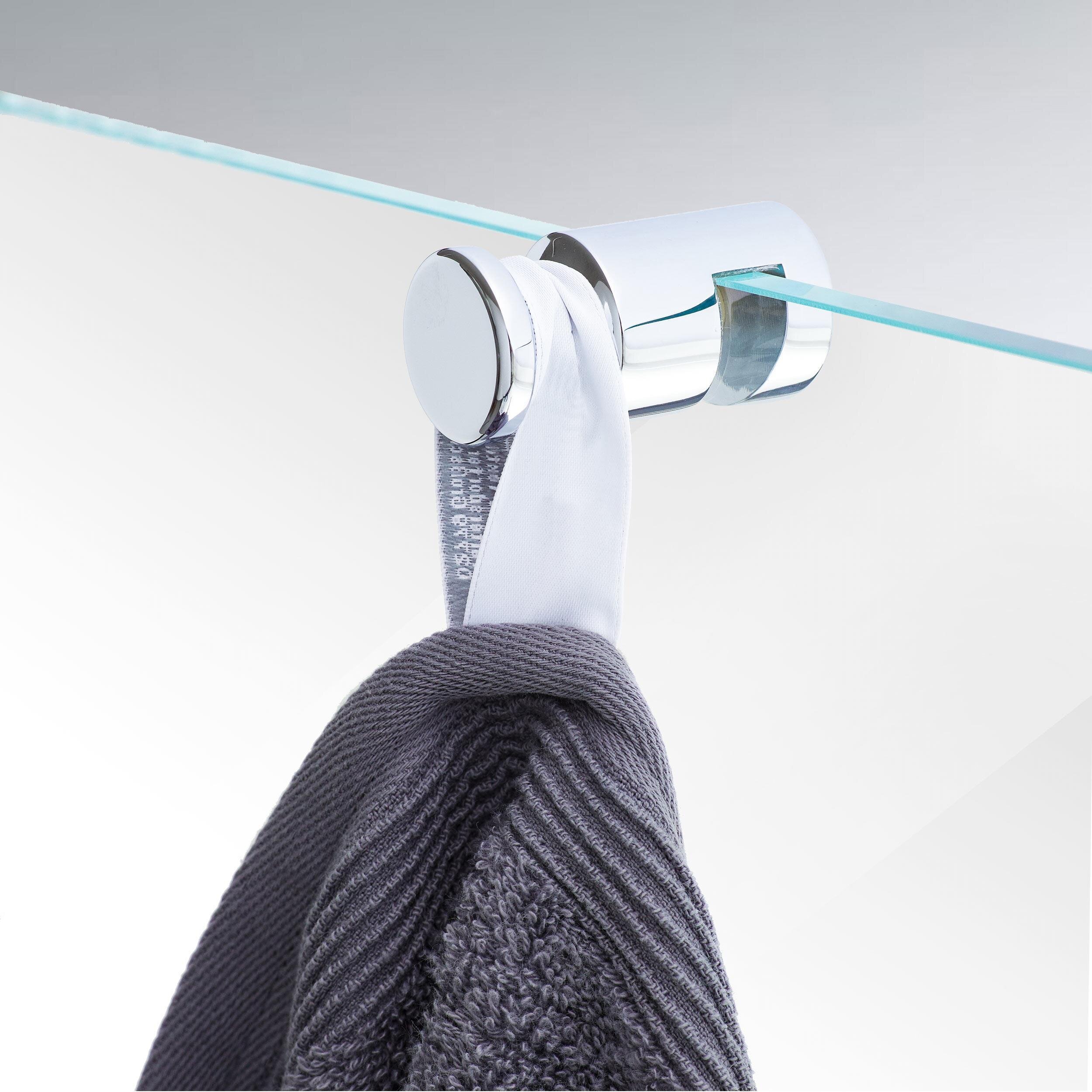 Handtuchhalter in Chrom an einer Glastür mit Handtuch
